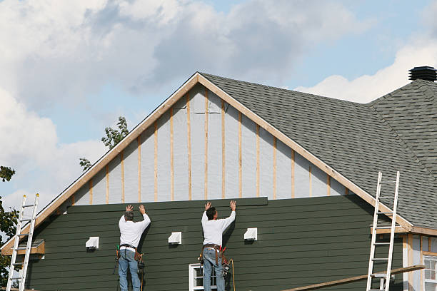 Professional Siding Replacement technician working in Ferguson, NC
